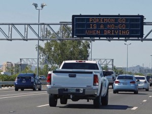 Signboards requesting drivers not to play and drive